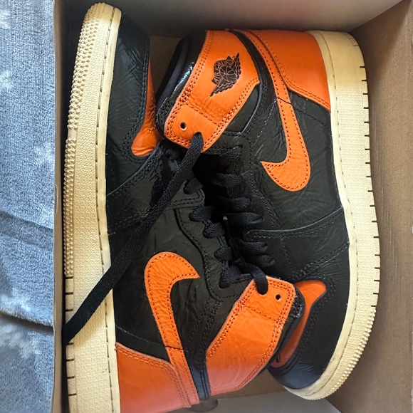 Air Jordan High Black and Orange Sneakers - Main Image